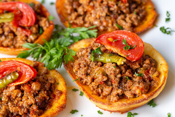 Traditional Turkish food; baked potato dish with minced meat, Turkish name; Patates karniyarik