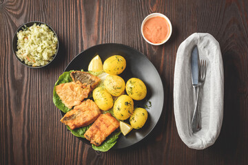 fried fish with new potatoes