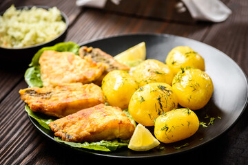 fried fish with new potatoes