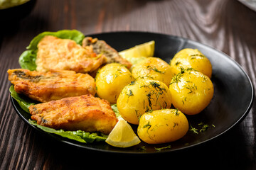 fried fish with new potatoes
