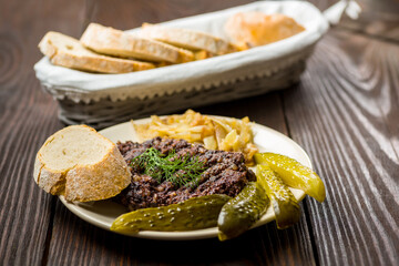 fried black pudding with additions and bread