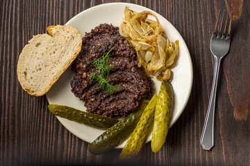 fried black pudding with additions and bread