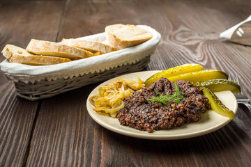 fried black pudding with additions and bread