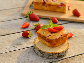 Delicious summer dessert strawberry pie, sweet delicious festive cake with strawberries on a round stand