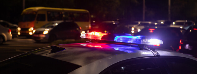 police car lights at night in city © Daniel