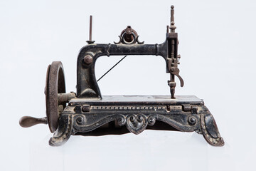 Vintage sewing machine isolated on white
