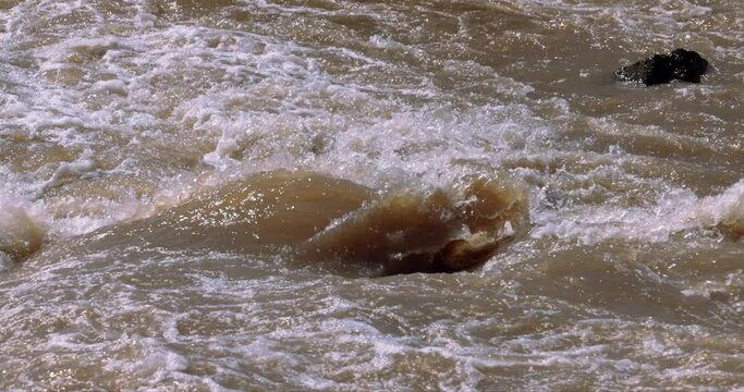 Slow motion footage of rapids on the olifants river during a flood. Kruger park