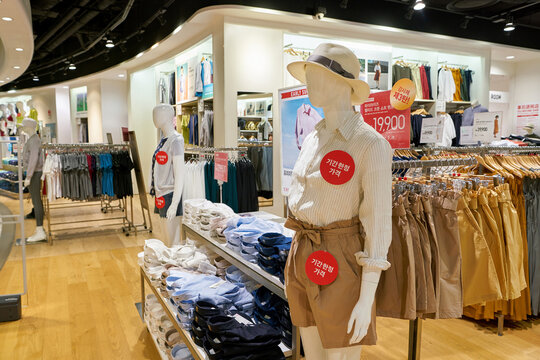 BUSAN, SOUTH KOREA - MAY 28, 2017: inside Uniqlo store at Lotte Department Store in Busan. Uniqlo Co., Ltd. is a Japanese casual wear designer, manufacturer and retailer.
