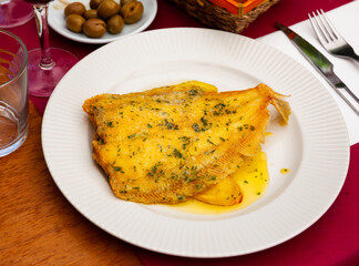 Lenguado meuniere in lemon sauce closeup. French cuisine