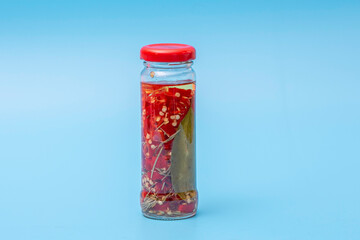 pickled red pepper on a blue background