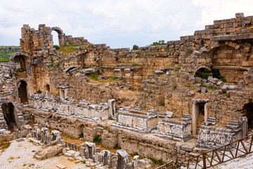Ruins of ancient amphitheater (Theater) in Perge. Built in the Greco-Roman style, Perge is an ancient Greek city in Antalya. Turkey