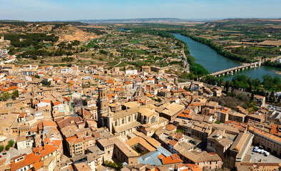 Aerial cityscape of Tudela with view of Ebro River and cathedral. Autonomous community of Navarre,...