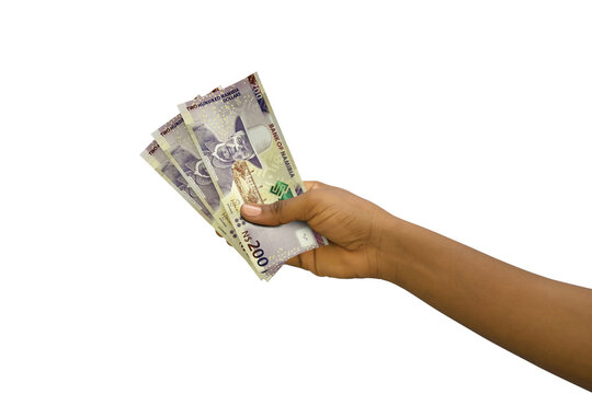 Fair hand holding 3D rendered 200 Namibian dollar notes isolated on white background