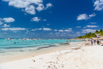 People swimming near a white sand beach, turquoise caribbean sea, Isla Mujeres island, Caribbean Sea, Cancun, Yucatan, Mexico