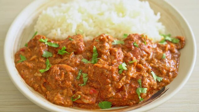 chicken tikka masala with rice on plate - Indian food style