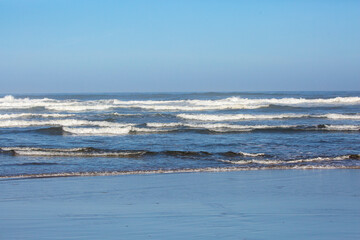 Breakers coming down on an Oregon beach in August