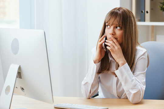 Excited Adorable Blonde Businesswoman Worker Make Difficult Decision Talking With Client In Call In Light Modern Office. Nervous Employee Work On Computer Online In Support Service. Copy Space