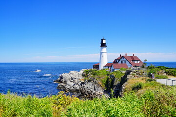 Fototapeta na wymiar Atlantic ocean waves and rock beach along coastline in Portland, Maine, USA 