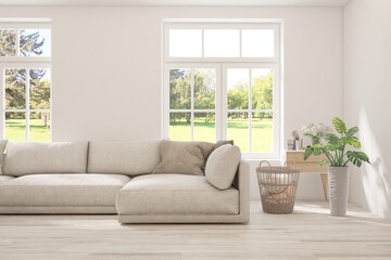 White living room with sofa and summer landscape in window. Scandinavian interior design. 3D illustration