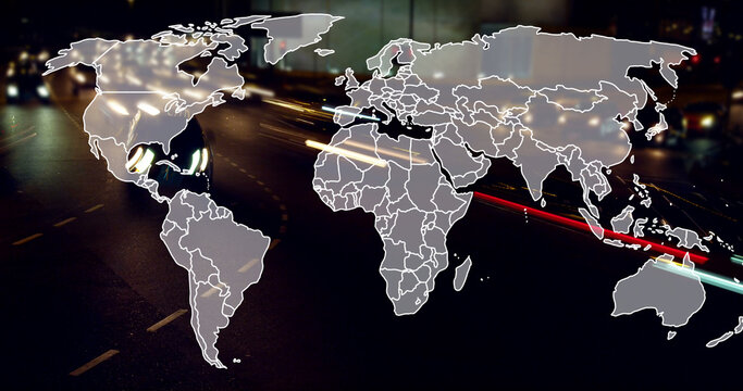 Image of world map over fast speed traffic on city road at night