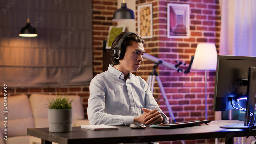 Poster male freelancer listening to remote class lesson or training webinar on computer to learn startup bu