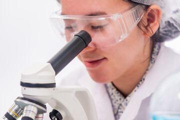 Naklejka premium Teenager scientist in medical science laboratory,Science and education.