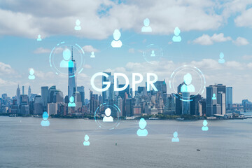 Aerial panoramic helicopter city view of Lower Manhattan and Downtown financial district, New York, USA. GDPR hologram, concept of data protection regulation and privacy for all individuals