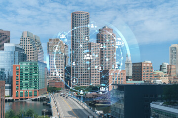 Naklejka premium Panorama city view of Boston Harbor at day time, Massachusetts. Buildings of financial downtown. Glowing Social media icons. The concept of networking and establishing new connections between people