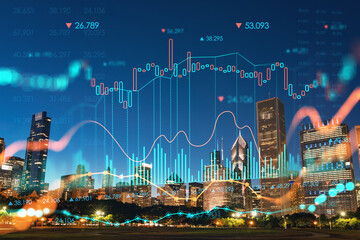 Naklejka premium Chicago skyline from Butler Field to financial district skyscrapers, night time, Illinois, USA. Park, gardens. Forex graph hologram. The concept of internet trading, brokerage and fundamental analysis