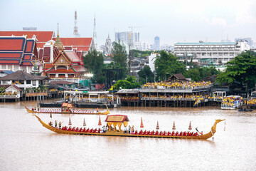 Fototapeta na wymiar BANGKOK THAILAND -12 JUN 2006: Decorated barge parades at the Chao Phraya River during Fry the Kathina ceremony cloth of Royal Barge Procession on, in Bangkok, Thailand