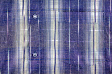 Blue men's shirt and pocket close-up. Men's shirt in blue with stripes and a pocket. High...