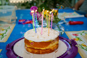 Birthday cake with candles. Sweet dessert for a party.