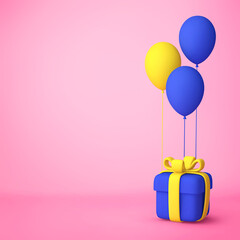 Gift box with blue and yellow balloons on pink background