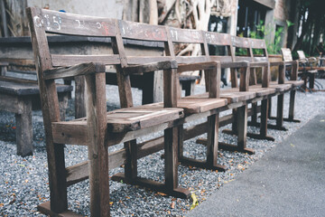 Many old wooden chairs are placed decorative in cafe From the old look, it also provides the psychological and artistic value that is currently difficult to find.