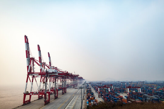 Cranes and shipping containers at port