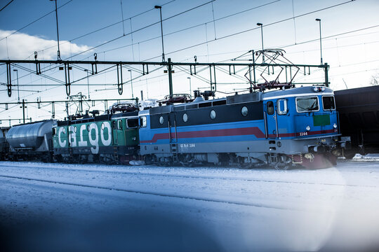 Train at railway station during winter