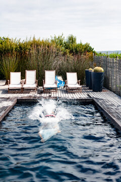 Woman swimming in snall pool