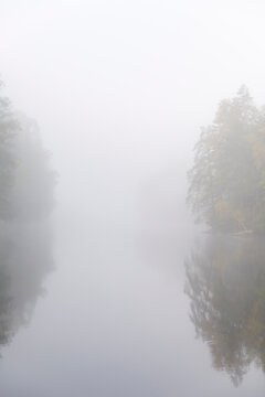 Stora Skiren lake under fog in Sweden