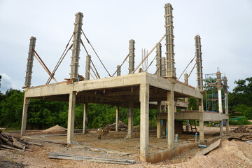 The concrete column is on the second floor of a building. Construction progress for periodic assessment reports.  