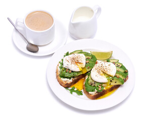 Freshly made poached egg and Avocado toasts isolated on white background