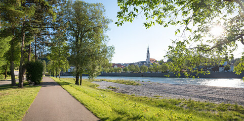 walkway Isar riverside with view to old town Bad Tolz, in the morning