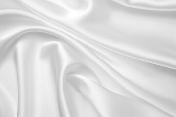 Obraz premium Smooth elegant white silk or satin luxury cloth texture can use as wedding background. Luxurious Christmas background or New Year background design