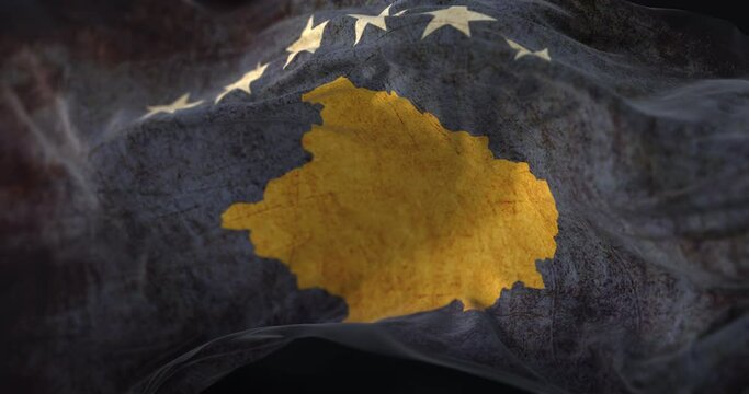 Old Kosovo Flag waving at wind. Loop