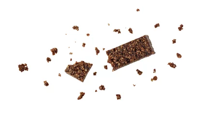 Zelfklevend Fotobehang Tasty broken healthy bar from whole oat grain and chocolate  with crumbs flying isolated on white background. Pastry shop card with copy space. © BarTa
