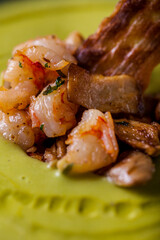 Soup with pumpkin, shrimp, meat and bacon