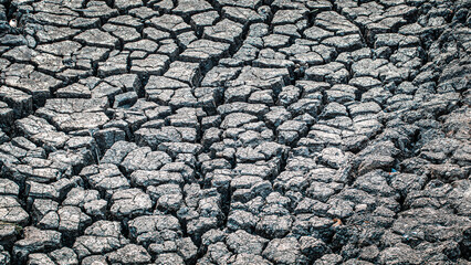 Texture cracked, dry the surface of the earth. global shortage of water on the planet. Global warming and greenhouse effect concept.