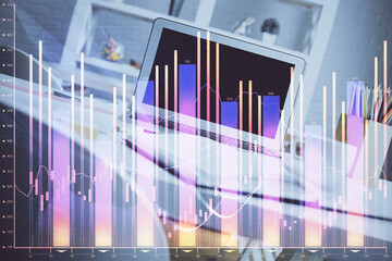 Forex market graph hologram and personal computer on background. Double exposure. Concept of investment.