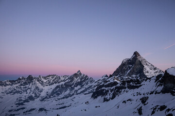 Fototapeta na wymiar Mountain landscape at sunset with Matterhorn in Alps
