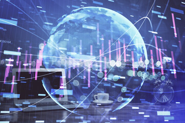 Forex market graph hologram and personal computer on background. Double exposure. Concept of...