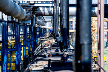 Filling tanks at an oil refinery. Cargo oil transportation in tanks by rail